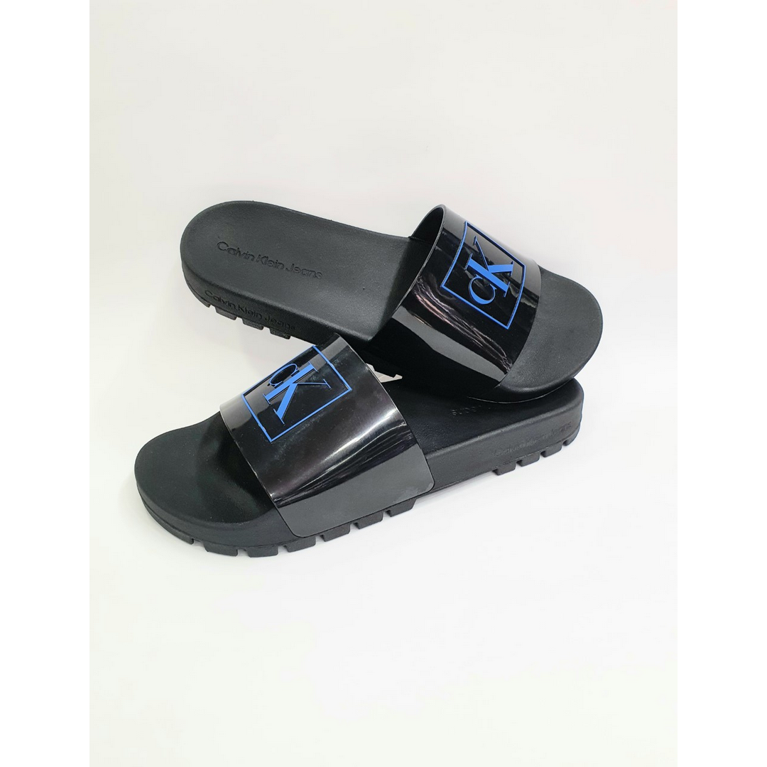 Ruck Slide Monogram Rubber Black/Imperial Blu / 42