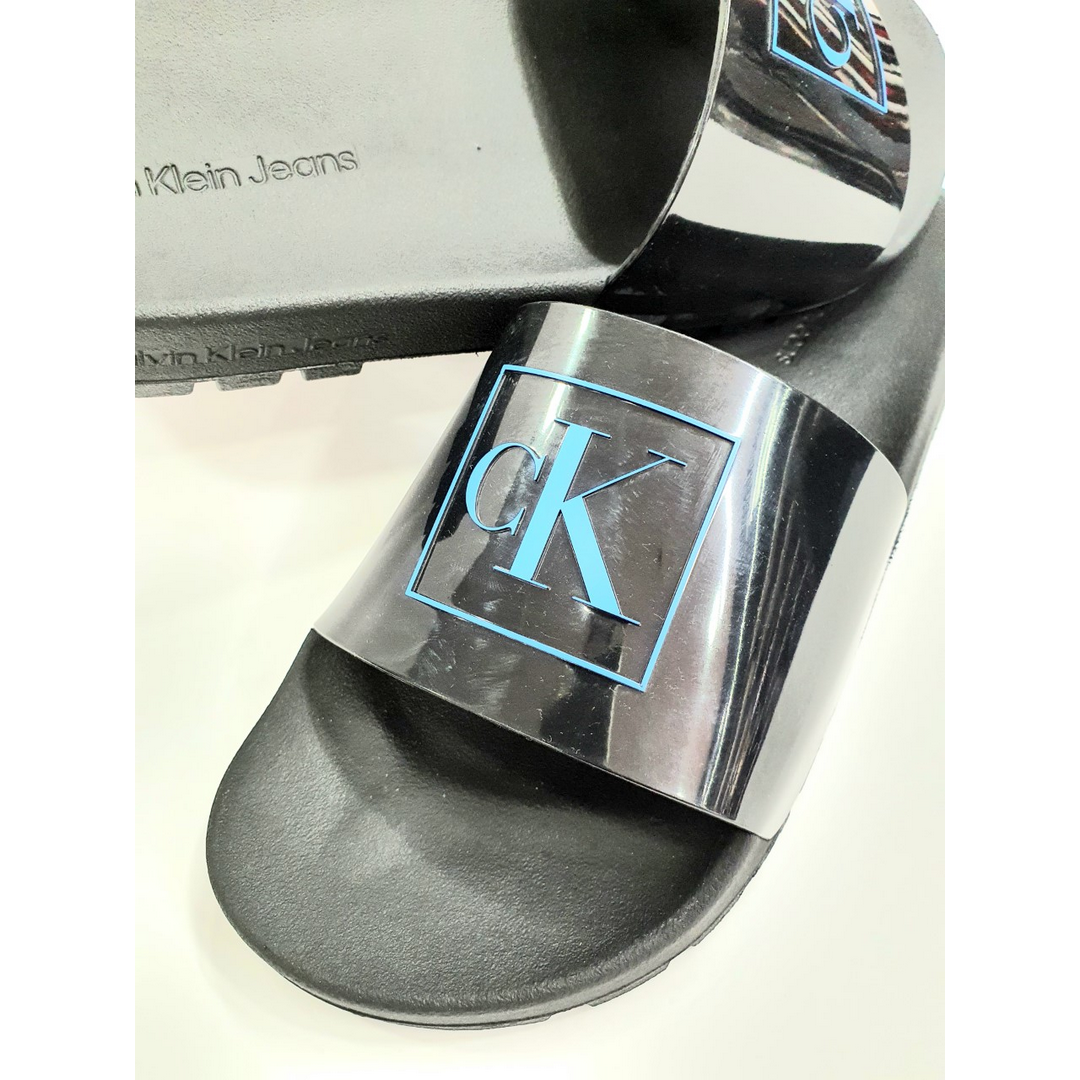 Ruck Slide Monogram Rubber Black/Imperial Blu / 42